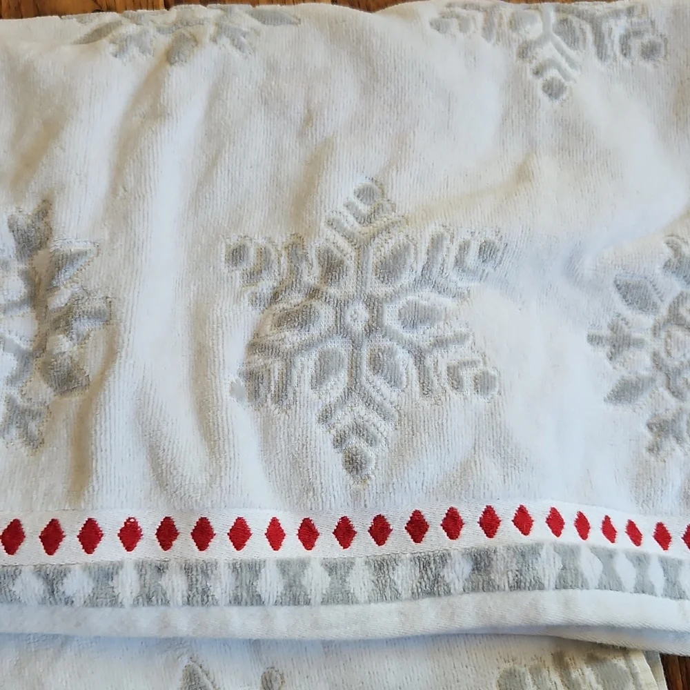 Snowflake Patterned Towel with Red Accents